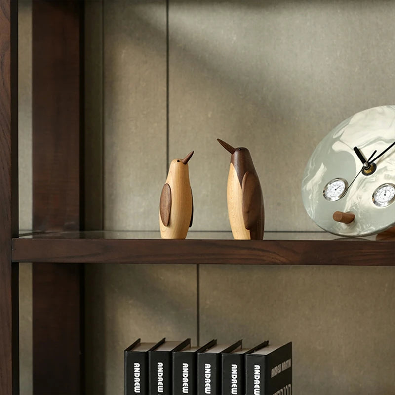 Pingüinos en Escultura de Madera.