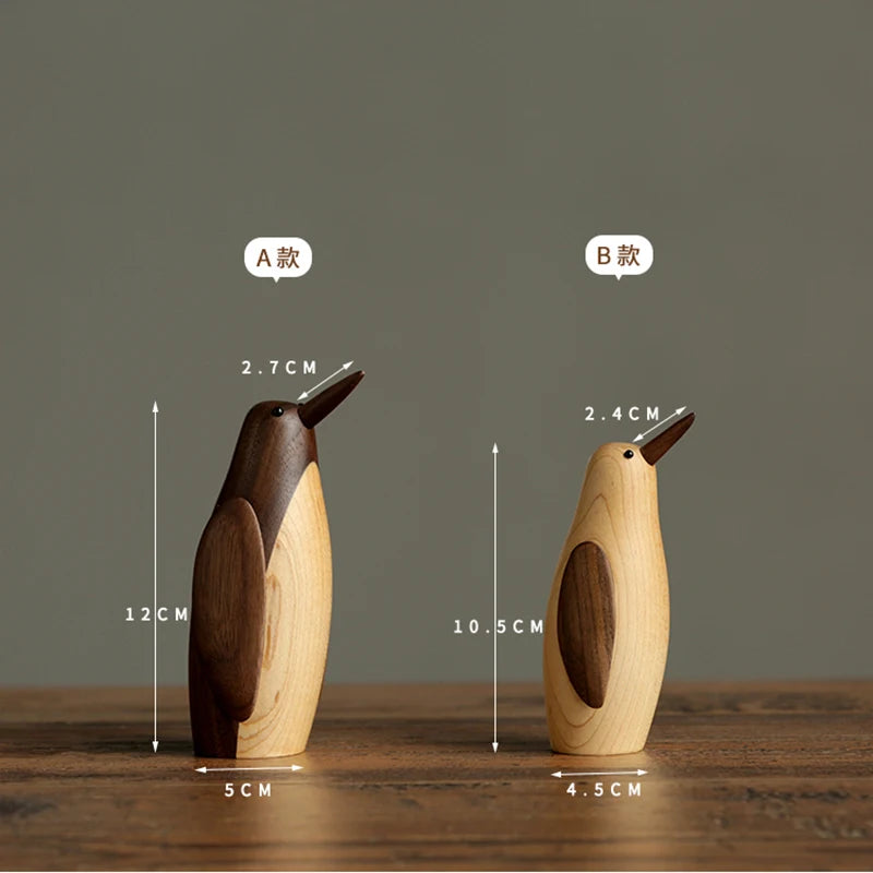 Pingüinos en Escultura de Madera.