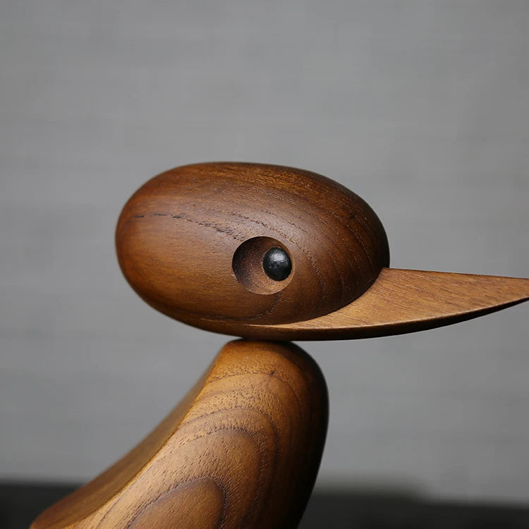 Familia de Patos en esculturas de madera.