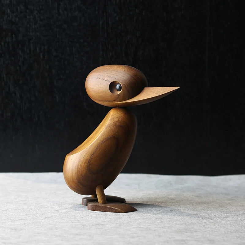 Familia de Patos en esculturas de madera.