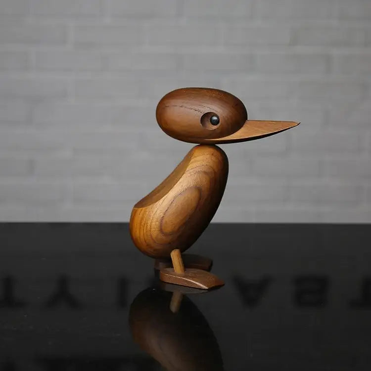 Familia de Patos en esculturas de madera.