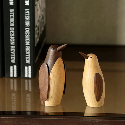 Pingüinos en Escultura de Madera.